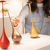 Dondolina table lamp - Matt gold | Zafferano Italia